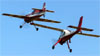 Sukhoi SU-31 (esquerda), PT-ZSL, e PZL-104 Wilga 35, PP-ZYW. (19/07/2019)