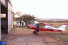 Aero Boero 115, PP-GKB, "Condor", do Aero-clube de Araraquara, estacionado em frente ao seu hangar, aps um vo. (19/08/2006)