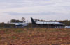 A esquerda, um Cessna C208B Grand Caravan, PT-MED e a direita, o Swearingen SA-227AT Merlin IVC, prefixo N313D, da Amrica Air Txi Areo, estacionados no ptio. (28/07/2006)