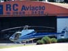 Eurocopter AS-350B2 Esquilo, PP-MIG, em frente ao hangar da RC Aviao. (01/07/2007)