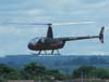 Robinson R-44 Raven II, PT-YGA, sobrevoando a taxiway em direo  Power Helicpteros para pousar. (29/12/2006)