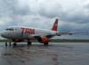 Airbus A319-132, PR-MAL, da TAM, estacionado no ptio em frente a torre de controle. (12/10/2006)