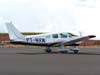 Piper/Embraer EMB-712 Tupi, PT-NXW, da Mariano Escola de Aviao, taxiando no ptio de aviao geral. (28/01/2007)