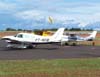 Piper/Embraer EMB-712 Tupi, PT-NXW, da Mariano Escola de Aviao, taxiando no ptio de aviao geral. (28/01/2007)