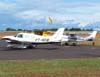 Piper/Embraer EMB-712 Tupi, PT-NXW, da Mariano Escola de Aviao, taxiando no ptio de aviao geral. (28/01/2007)