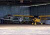 Aeronaves em um dos hangares do aeroporto de Batatais. No centro, est o Piper/Neiva EMB-711ST Corisco II, PT-VHO.
