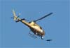 Eurocopter AS-350BA Esquilo, PT-YRE, "guia Dourada", da TV Record, sobrevoando So Paulo. (01/10/2009)