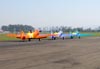 North American T-6D, PT-KRC (direita), PT-LDQ (meio) e PT-LDO, do Circo Areo (Esquadrilha Oi). (16/07/2011) Foto: Ricardo Rizzo Correia.