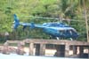 Bell 407, PT-YZL, da Pro-Fly, pousado em um heliponto na Praia dos Mangues, em Ilha Grande, Rio de Janeiro. (12/10/2006)