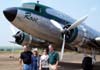 A partir da esquerda, o Comandante Joo Amaro, presidente do Museu da TAM, Betty Papas, dona Sonia, esposa do Comandante Joo Amaro, e John Papas, marido de  Betty, em frente ao Douglas DC-3 "Rose", N101KC, estacionado ao lado da torre de controle do aeroporto de So Carlos. (30/08/2007) Esta foto publicada em um jornal de Corona, Califrnia, EUA.