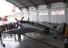 Republic P-47 Thunderbolt, pertencente à Fundação Santos Dumont. Está cedido à Fundação Eductam. À frente da aeronave, parentes de passageiros do Airbus A-319, PR-MAL, que trouxe turistas de caldas Novas, Goiás, em um vôo fretado. (12/10/2006)