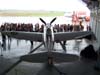 Republic P-47 Thunderbolt, pertencente à Fundação Santos Dumont. Está cedido à Fundação Eductam. À frente da aeronave, parentes de passageiros do Airbus A-319, PR-MAL, que trouxe turistas de caldas Novas, Goiás, em um vôo fretado. (12/10/2006)