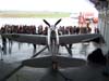Republic P-47 Thunderbolt, pertencente  Fundao Santos Dumont. Est cedido  Fundao Eductam.  frente da aeronave, parentes de passageiros do Airbus A-319, PR-MAL, que trouxe turistas de caldas Novas, Gois, em um vo fretado. (12/10/2006)