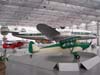 Em primeiro plano, Piper PA-12 Super Cruiser, fabricado em 1948 e, logo atrs, Lockheed L-049 Constellation com a pintura da Panair, ex-KLM, fabricado em 1946. (23/02/2007)