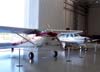 Cessna 185F Skywagon, PT-KJM, e ao fundo, Beechcraft Bonanza V35B, PT-IKN, ambos do presidente da Fundação EducTAM, João Amaro. (23/02/2007)