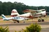 Piper PA-28R-200 Cherokee Arrow II, PT-DOO, e logo atrs, um Antonov/PZL-Mielec AN-2TD. Foto: Bruno Schmidt.