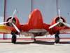 Beechcraft E-18S, PT-DHI, aeronave número 4 da Esquadrilha OI. Esta é uma das primeiras aparições deste avião com as cores vermelho e amarelo, em razão do lançamento do novo logo da empresa OI de telefonia.